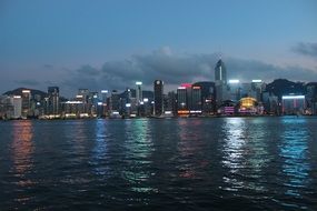 view from the water of the night hong kong