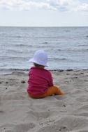 Child on sandy beach