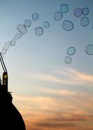 soap bubbles against the sunset