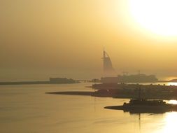 golden sunset at coastline, uae, dubai