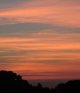 pink clouds at sunset sky in twilight