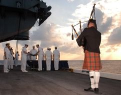 memorial ceremony of burial at uss enterprise