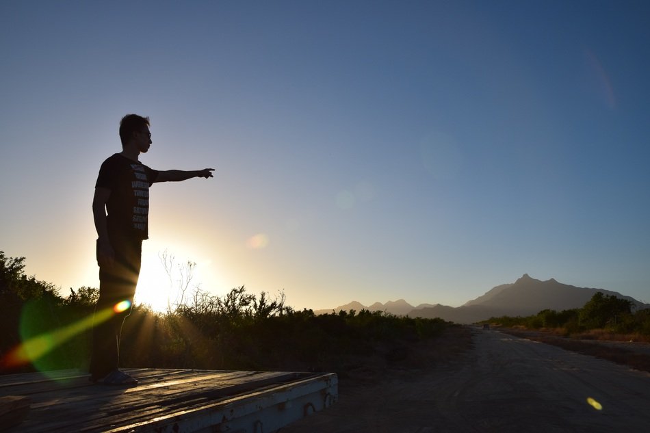 Man looking sunset in mexico