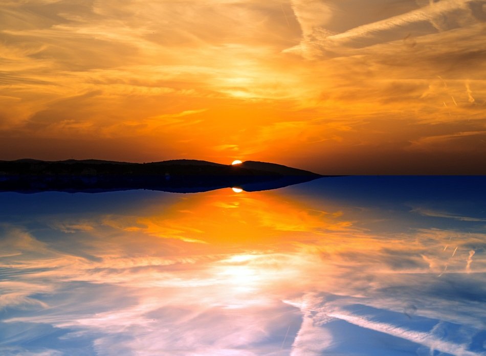 Reflection of the sky in the sea at sunset