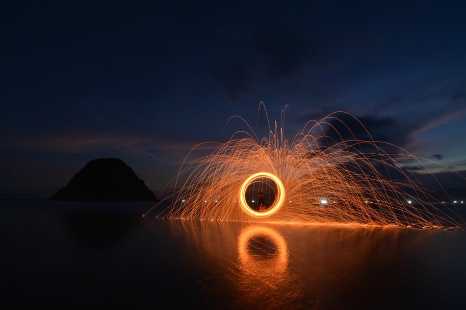 a ball of fire on the sea in Greece