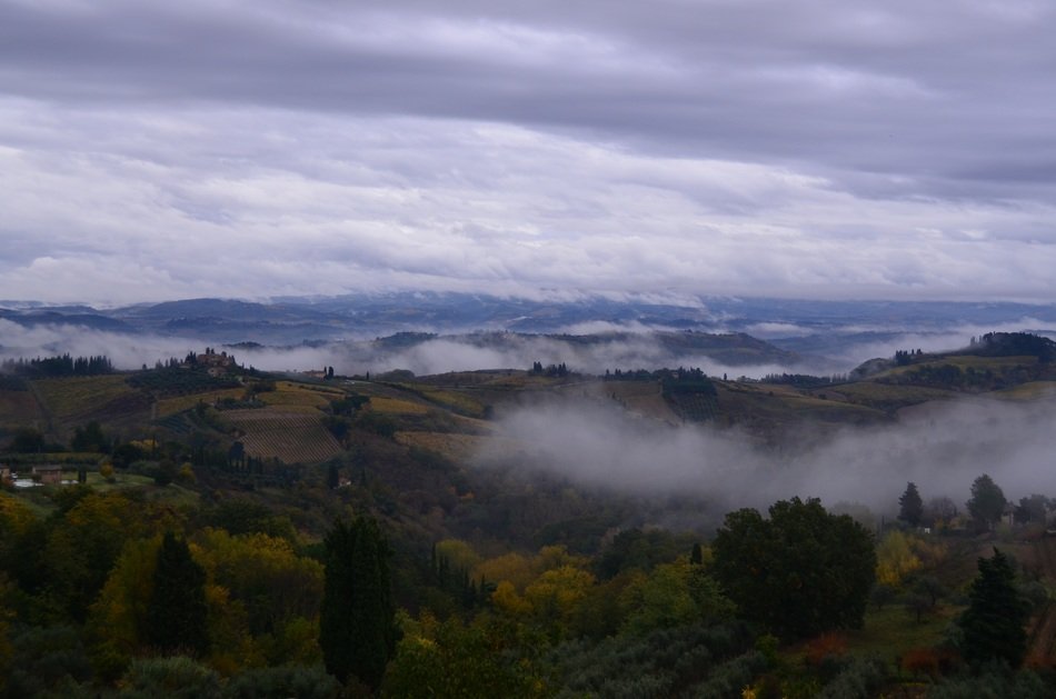 late summer hills in the clouds