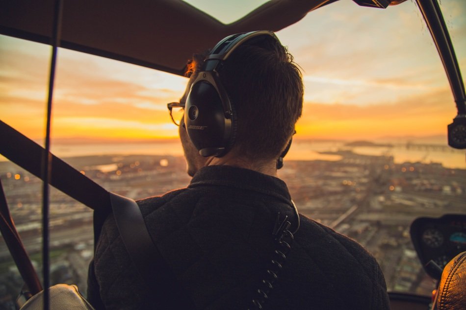 man in helicopter at flight