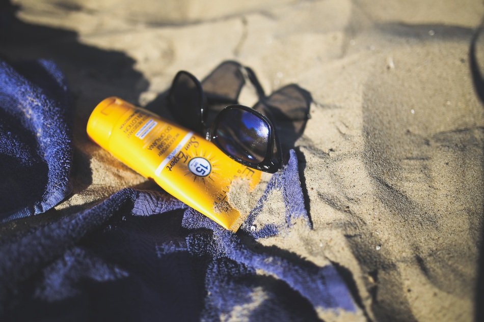sunblock on the beach cover