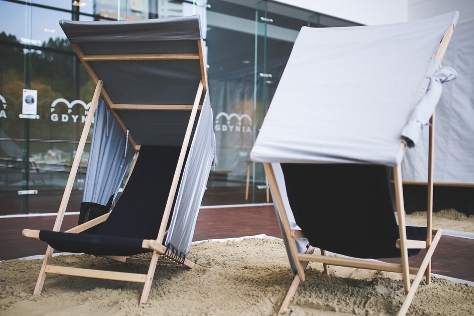 comfortable beach chairs on the sand