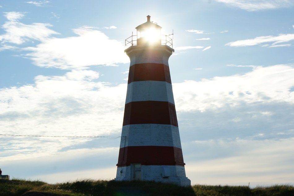 Shine and red and white lighthouse