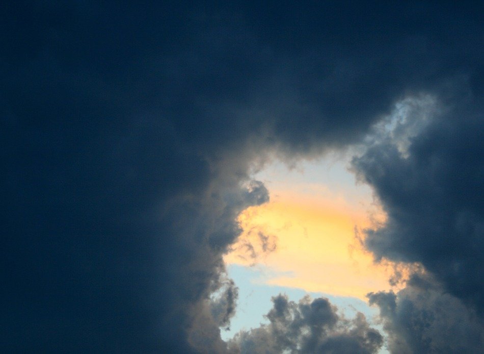 Dark clouds against the sunset