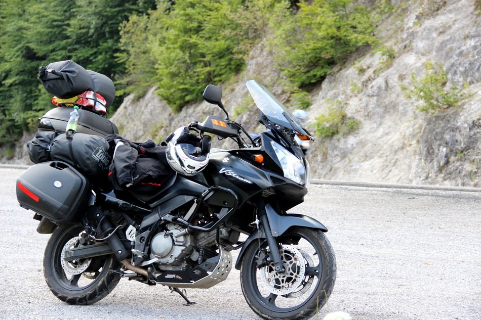 parked Suzuki motorcycle on a road