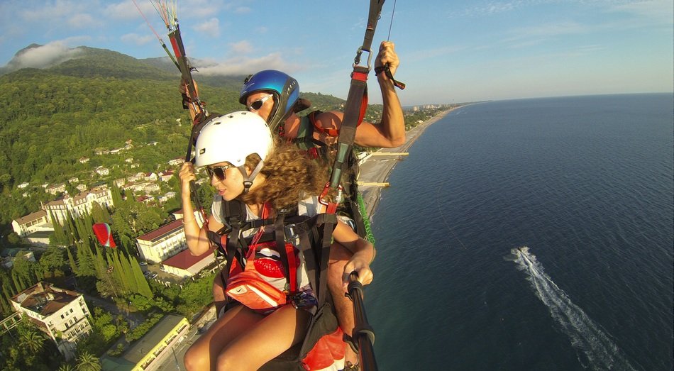 paragliding over water