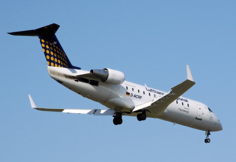 white lufthansa plane in the sky
