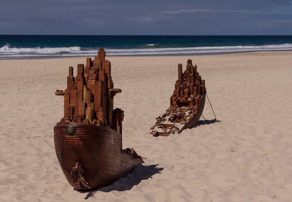wooden ship broken on the sand
