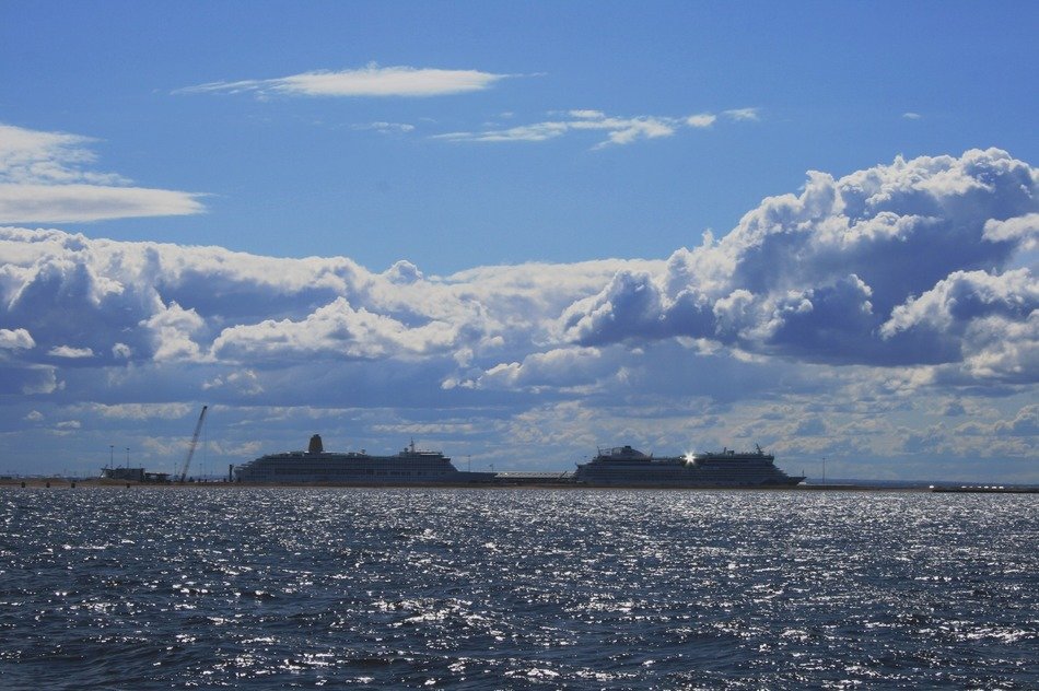 luxury yachts on glitening water in gulf of finland
