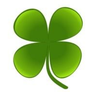 green clover leaf on a black background