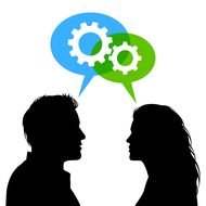 man and woman talking at work