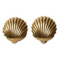 golden seashells on a white background