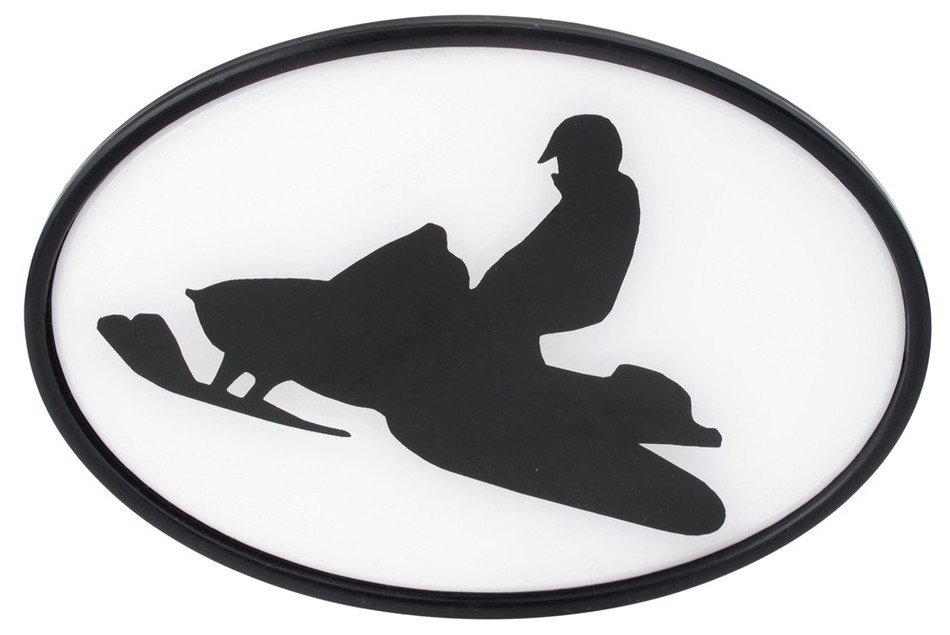 silhouette of a man on a snow scooter