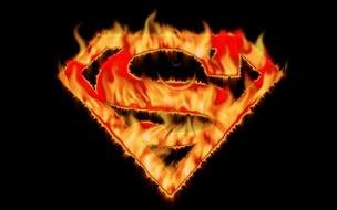 burning superhero character on a black background