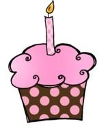 painted pink cupcake with one candle