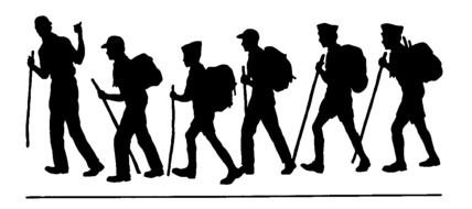 silhouette of people hiking