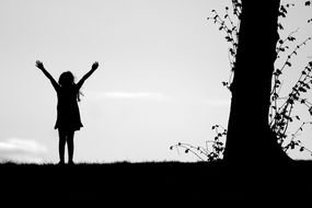Black and white photo of the girl near the tree clipart