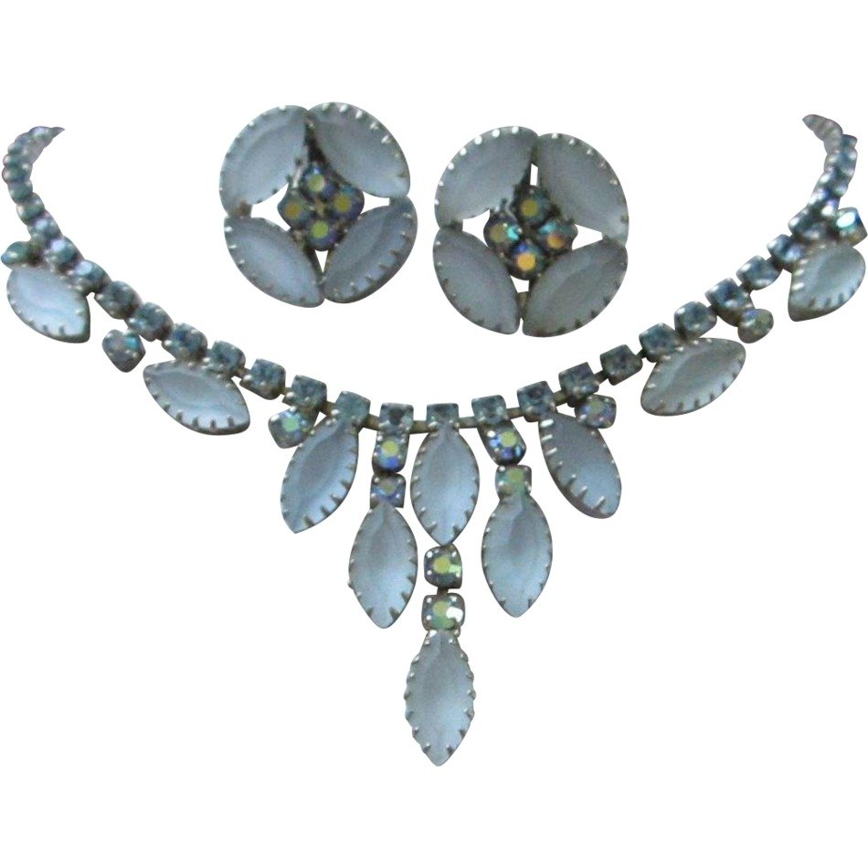 photo of earrings and necklaces with stones in the shape of petals
