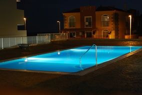 night swimming pool lighting in the hotel