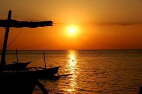 Colorful sunset above the water in Bali, Indonesia
