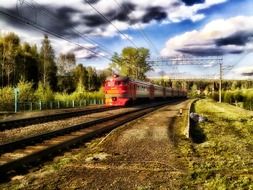 passenger train with red engine going in sverdlovsk russia