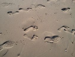 footsteps on wet sand