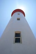 windows of a white lighthouse