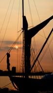 sunset on the background of a fishing boat