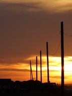 Sunset and power poles