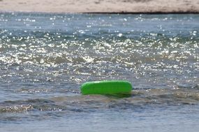 yellow swimming ring in the water