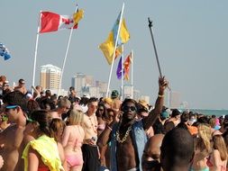 youn people crowd at beach party