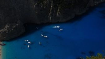 aerial view of boats in a picturesque bay