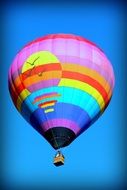 Bottom view of a bright multi-colored balloon