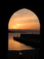 sunset through the castle window in Sicily