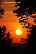 orange sunset over a village in Poland