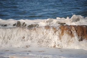 splashing waves in the sand