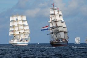 ships with high sails at sea