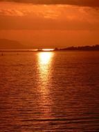landscape of stripe of sun light reflected at sunset