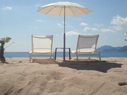 chairs and umbrella on the beach