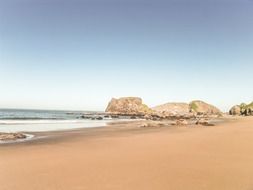 sandy beach coastline near ocean