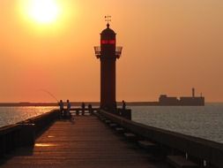 sea lighthouse at sunset