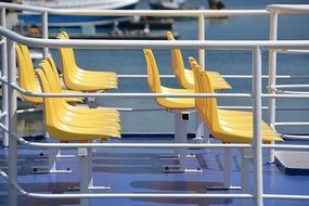 yellow seats on deck boat