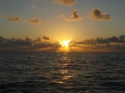 landscape of sunrise over the clouds over the ocean